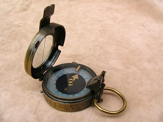 Prismatic marching compass with leather case circa 1917
